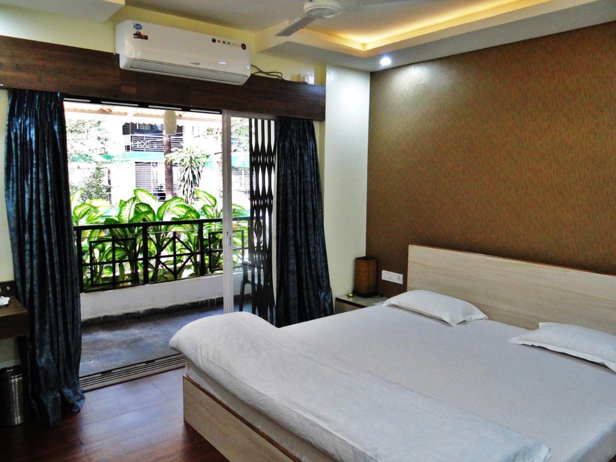 Apple Tree Apartments Koregaon Park Пуна Номер фото