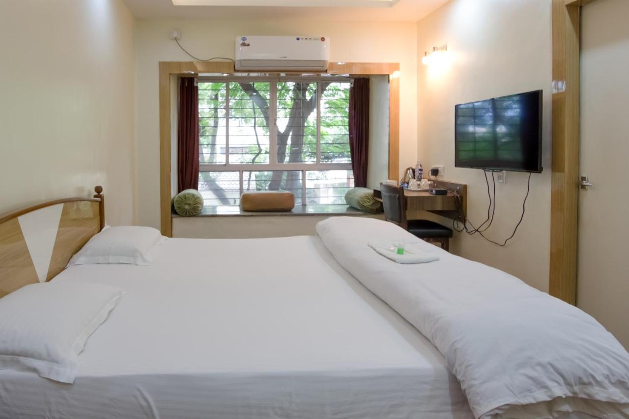 Apple Tree Apartments Koregaon Park Пуна Экстерьер фото