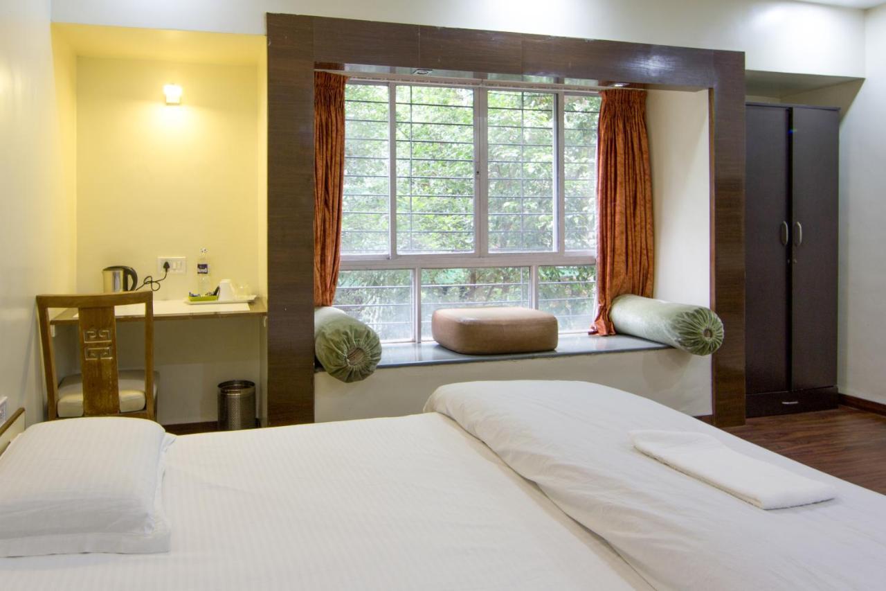 Apple Tree Apartments Koregaon Park Пуна Экстерьер фото